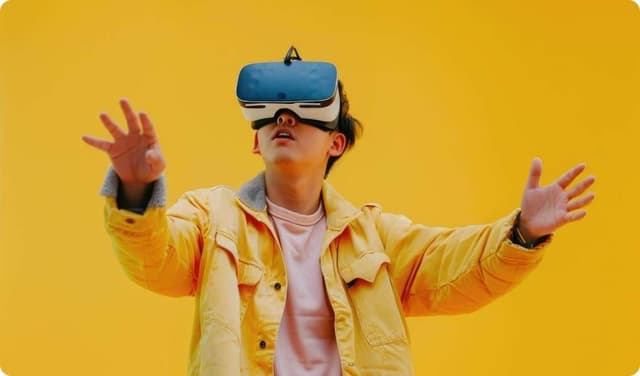 Yong man holding VR with hands over